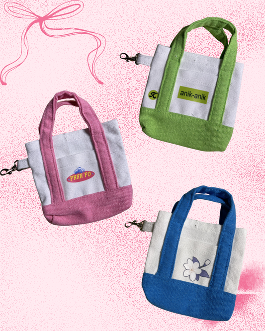 Three kilig komicro tote designs in pink, green, and blue