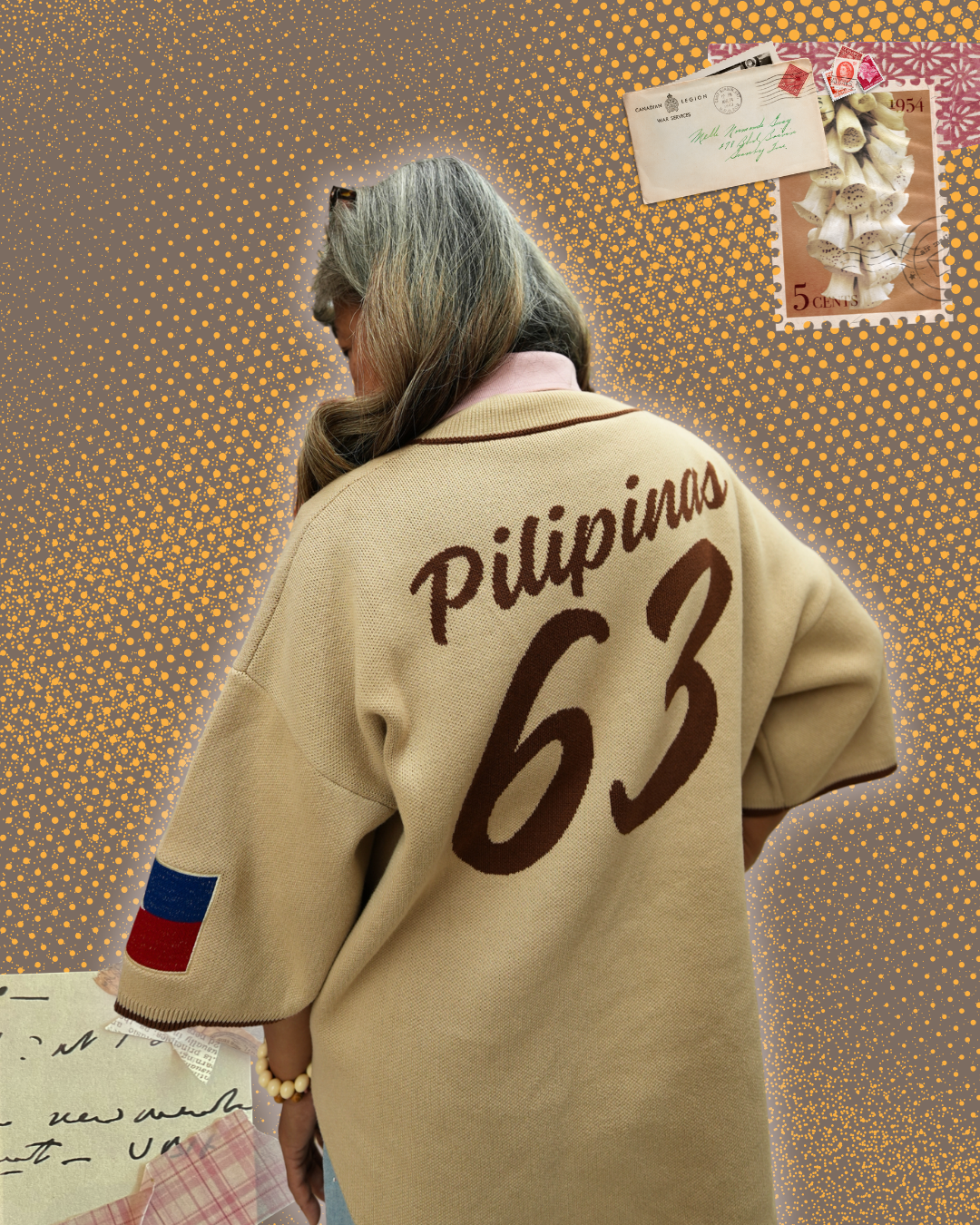 A person shown from behind wearing a beige oversized knit sweater with 'Pilipinas 63' printed in dark brown across the back. 
