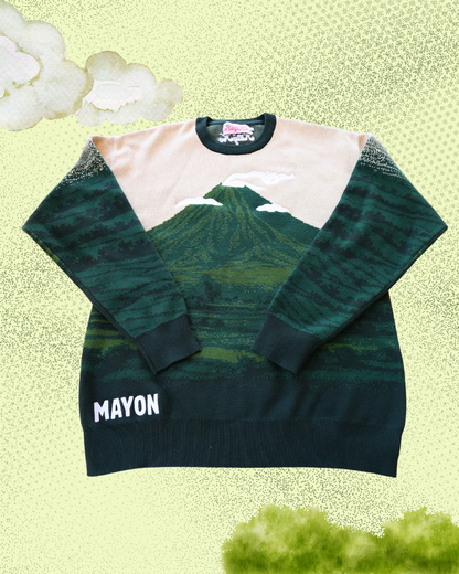 Sweater with mountain design and 'Mayon' text on a light green background