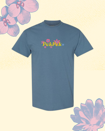 Dark Blue t-shirt with 'PekPek' graphic and text on a light yellow background with floral designs.